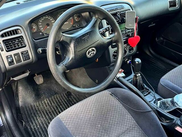 Чорний Тойота Авенсіс, об'ємом двигуна 2 л та пробігом 217 тис. км за 4000 $, фото 3 на Automoto.ua