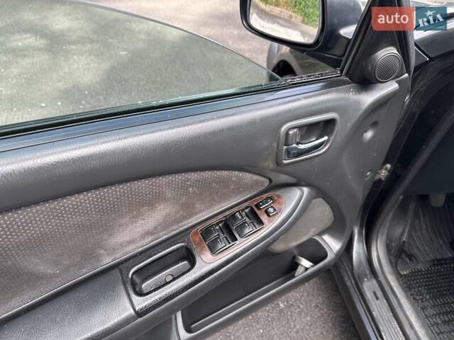 Черный Тойота Авенсис, объемом двигателя 1.6 л и пробегом 317 тыс. км за 3600 $, фото 14 на Automoto.ua