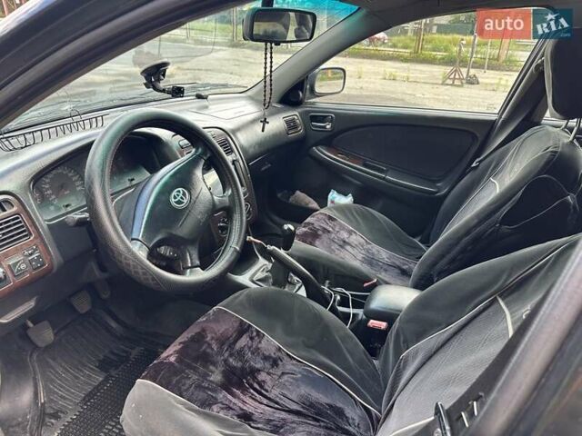 Черный Тойота Авенсис, объемом двигателя 1.6 л и пробегом 317 тыс. км за 3600 $, фото 15 на Automoto.ua