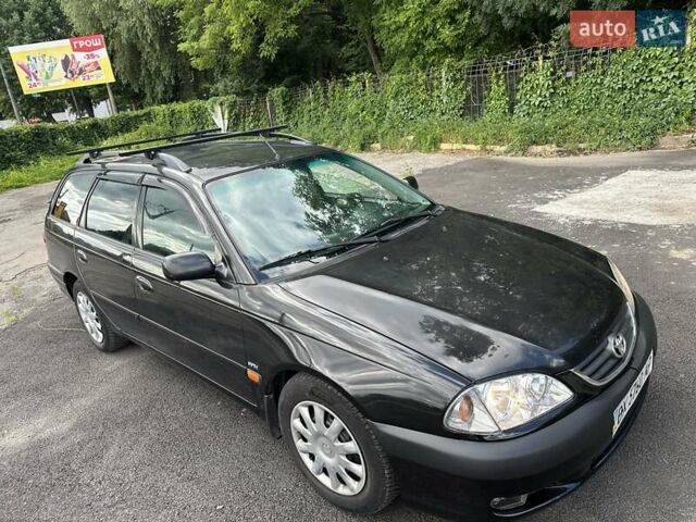 Черный Тойота Авенсис, объемом двигателя 1.6 л и пробегом 317 тыс. км за 3600 $, фото 4 на Automoto.ua