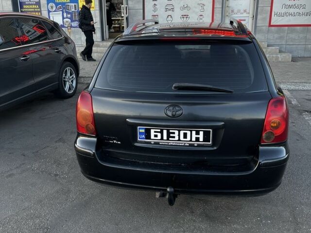 Черный Тойота Авенсис, объемом двигателя 2 л и пробегом 406 тыс. км за 2649 $, фото 4 на Automoto.ua