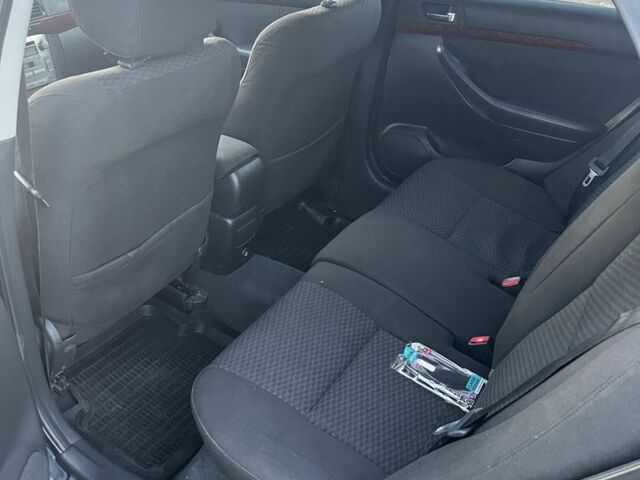 Черный Тойота Авенсис, объемом двигателя 2 л и пробегом 406 тыс. км за 2649 $, фото 9 на Automoto.ua