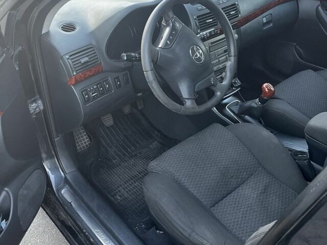 Черный Тойота Авенсис, объемом двигателя 2 л и пробегом 406 тыс. км за 2649 $, фото 7 на Automoto.ua