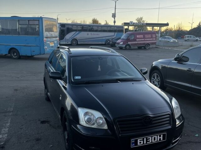 Черный Тойота Авенсис, объемом двигателя 2 л и пробегом 406 тыс. км за 2649 $, фото 1 на Automoto.ua