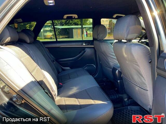 Чорний Тойота Авенсіс, об'ємом двигуна 2 л та пробігом 264 тис. км за 5400 $, фото 5 на Automoto.ua