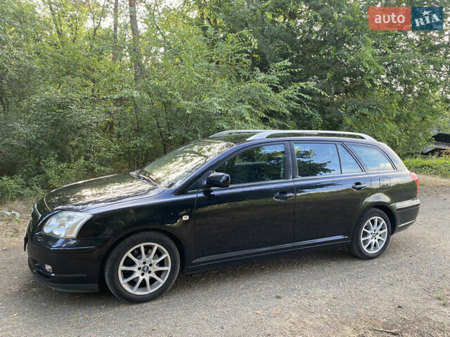Черный Тойота Авенсис, объемом двигателя 2 л и пробегом 234 тыс. км за 6800 $, фото 3 на Automoto.ua