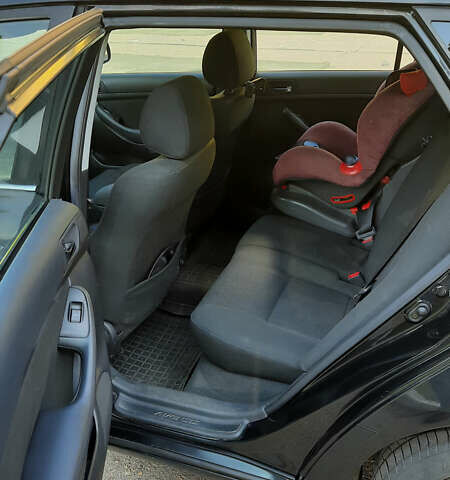 Черный Тойота Авенсис, объемом двигателя 2 л и пробегом 198 тыс. км за 5300 $, фото 9 на Automoto.ua