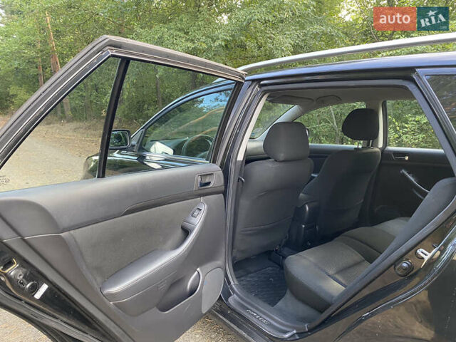 Черный Тойота Авенсис, объемом двигателя 2 л и пробегом 234 тыс. км за 6800 $, фото 10 на Automoto.ua