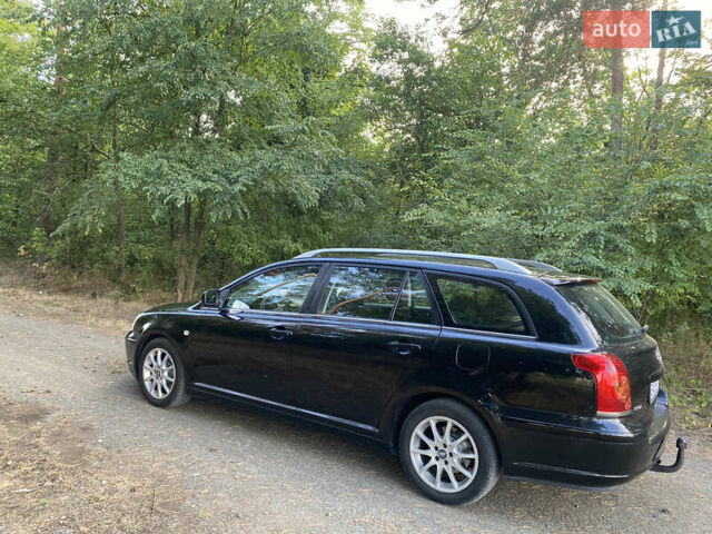 Черный Тойота Авенсис, объемом двигателя 2 л и пробегом 234 тыс. км за 6800 $, фото 4 на Automoto.ua