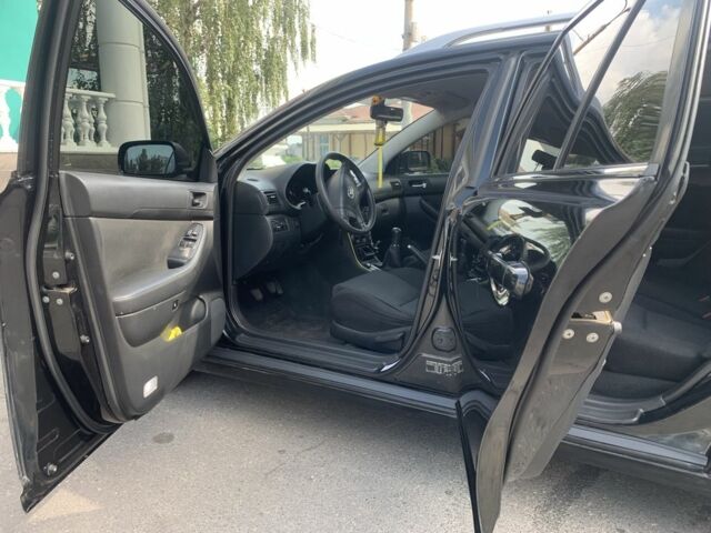Черный Тойота Авенсис, объемом двигателя 1.8 л и пробегом 331 тыс. км за 4200 $, фото 6 на Automoto.ua