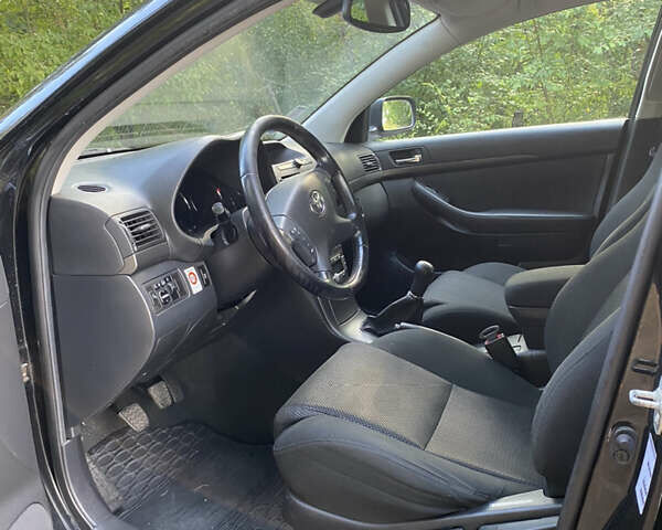 Черный Тойота Авенсис, объемом двигателя 2 л и пробегом 234 тыс. км за 6800 $, фото 7 на Automoto.ua