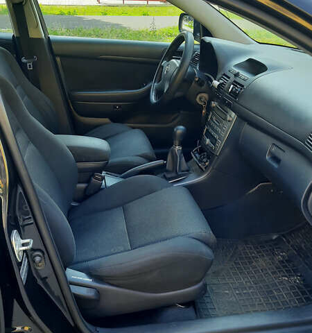 Черный Тойота Авенсис, объемом двигателя 2 л и пробегом 198 тыс. км за 5300 $, фото 8 на Automoto.ua