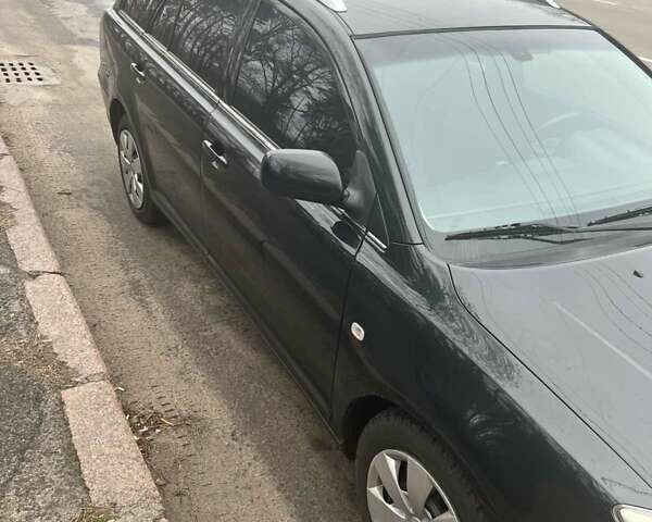 Черный Тойота Авенсис, объемом двигателя 2 л и пробегом 253 тыс. км за 5500 $, фото 3 на Automoto.ua