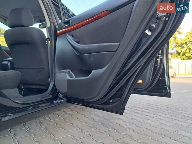 Черный Тойота Авенсис, объемом двигателя 2 л и пробегом 215 тыс. км за 5850 $, фото 42 на Automoto.ua