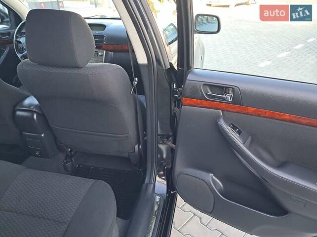 Черный Тойота Авенсис, объемом двигателя 2 л и пробегом 215 тыс. км за 5850 $, фото 48 на Automoto.ua