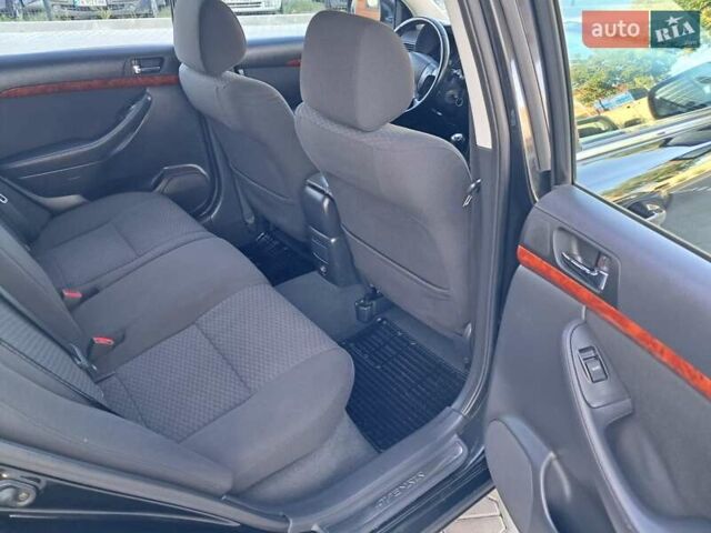 Черный Тойота Авенсис, объемом двигателя 2 л и пробегом 215 тыс. км за 5850 $, фото 51 на Automoto.ua