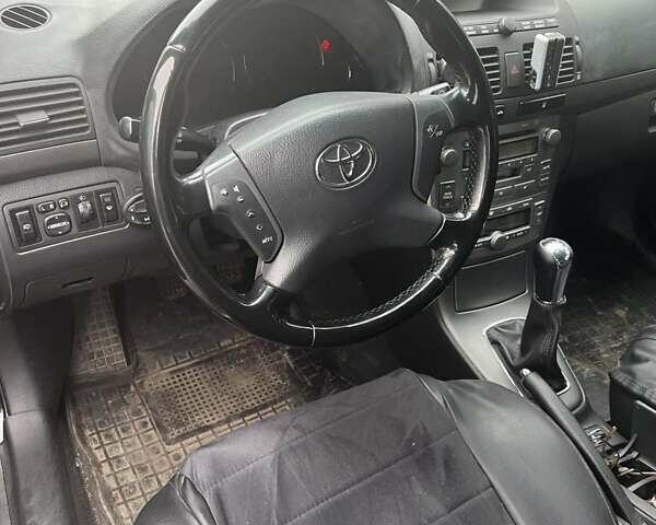 Черный Тойота Авенсис, объемом двигателя 2 л и пробегом 253 тыс. км за 5500 $, фото 7 на Automoto.ua