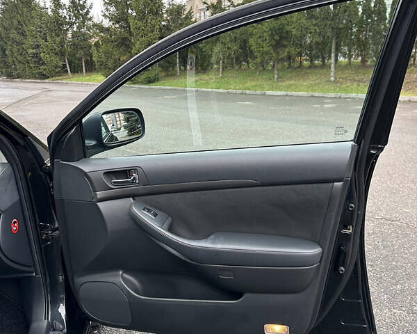 Черный Тойота Авенсис, объемом двигателя 1.8 л и пробегом 160 тыс. км за 6750 $, фото 28 на Automoto.ua