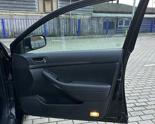 Черный Тойота Авенсис, объемом двигателя 1.8 л и пробегом 160 тыс. км за 6900 $, фото 30 на Automoto.ua