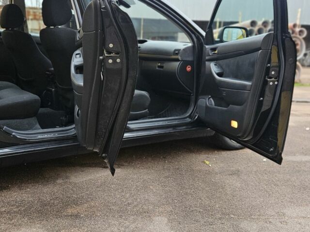 Черный Тойота Авенсис, объемом двигателя 2 л и пробегом 327 тыс. км за 2607 $, фото 16 на Automoto.ua