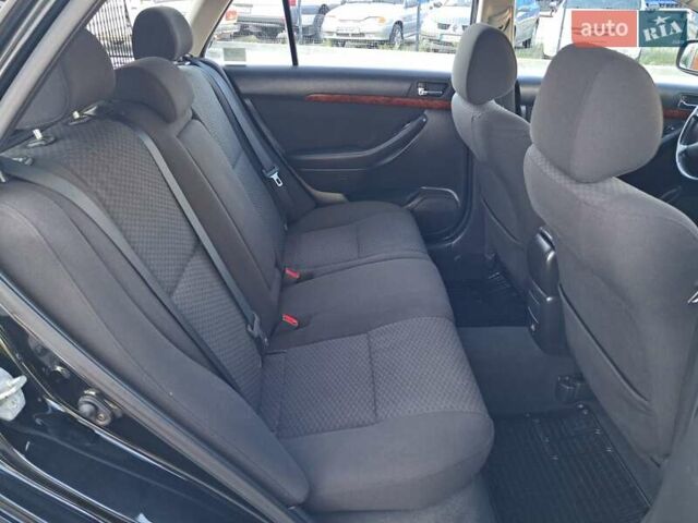 Чорний Тойота Авенсіс, об'ємом двигуна 2 л та пробігом 218 тис. км за 6500 $, фото 46 на Automoto.ua