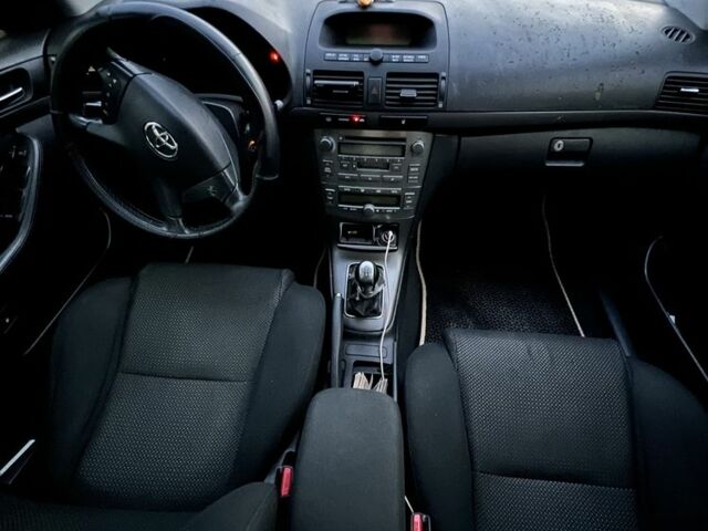 Черный Тойота Авенсис, объемом двигателя 2 л и пробегом 215 тыс. км за 5300 $, фото 10 на Automoto.ua