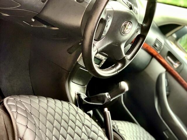 Чорний Тойота Авенсіс, об'ємом двигуна 2 л та пробігом 228 тис. км за 5500 $, фото 5 на Automoto.ua
