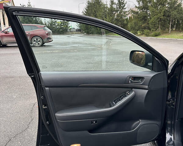 Черный Тойота Авенсис, объемом двигателя 1.8 л и пробегом 160 тыс. км за 6750 $, фото 23 на Automoto.ua