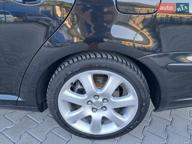 Черный Тойота Авенсис, объемом двигателя 2 л и пробегом 215 тыс. км за 5850 $, фото 30 на Automoto.ua