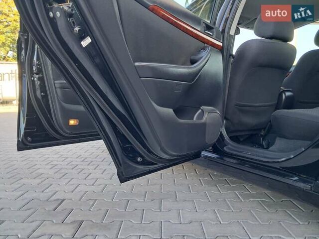 Черный Тойота Авенсис, объемом двигателя 2 л и пробегом 215 тыс. км за 5850 $, фото 36 на Automoto.ua
