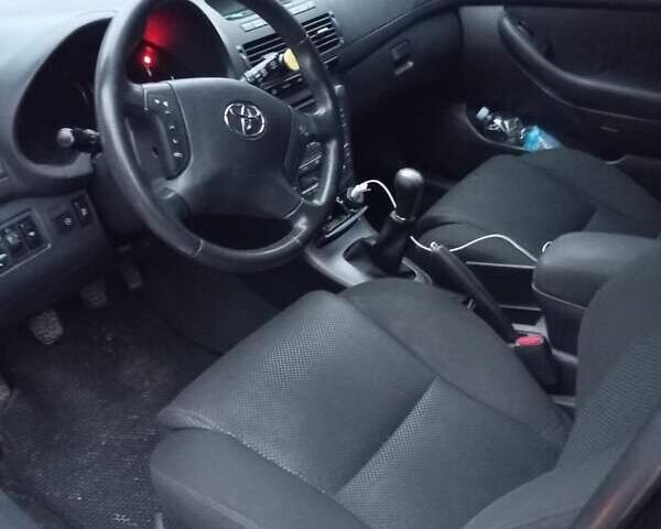 Черный Тойота Авенсис, объемом двигателя 1.8 л и пробегом 299 тыс. км за 6200 $, фото 2 на Automoto.ua