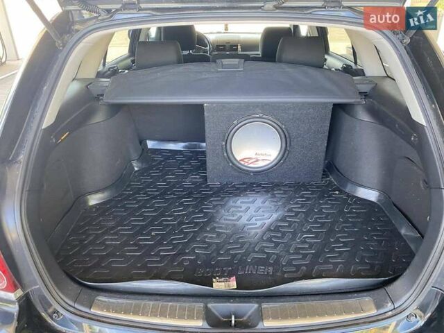 Черный Тойота Авенсис, объемом двигателя 2 л и пробегом 309 тыс. км за 7100 $, фото 24 на Automoto.ua