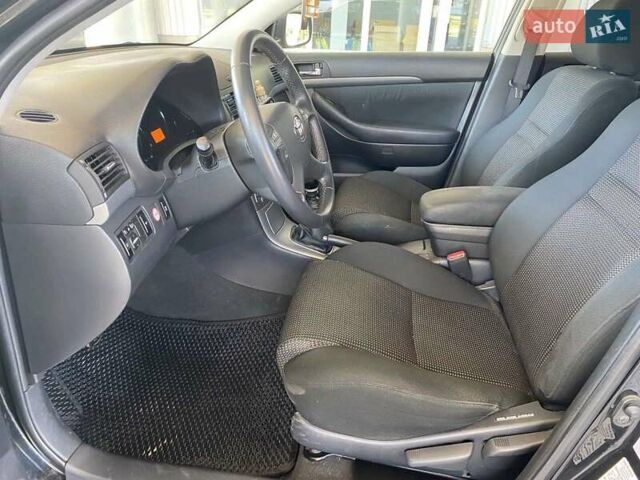 Черный Тойота Авенсис, объемом двигателя 2 л и пробегом 309 тыс. км за 7100 $, фото 13 на Automoto.ua