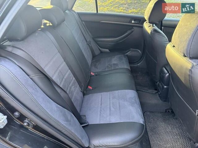 Черный Тойота Авенсис, объемом двигателя 2 л и пробегом 430 тыс. км за 6000 $, фото 4 на Automoto.ua