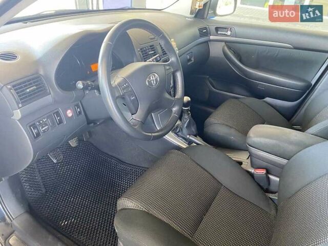 Черный Тойота Авенсис, объемом двигателя 2 л и пробегом 309 тыс. км за 7100 $, фото 14 на Automoto.ua