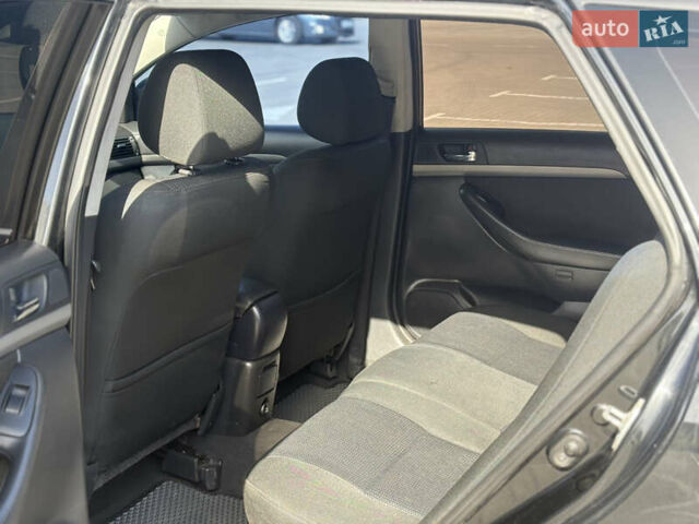 Чорний Тойота Авенсіс, об'ємом двигуна 2 л та пробігом 296 тис. км за 6200 $, фото 38 на Automoto.ua