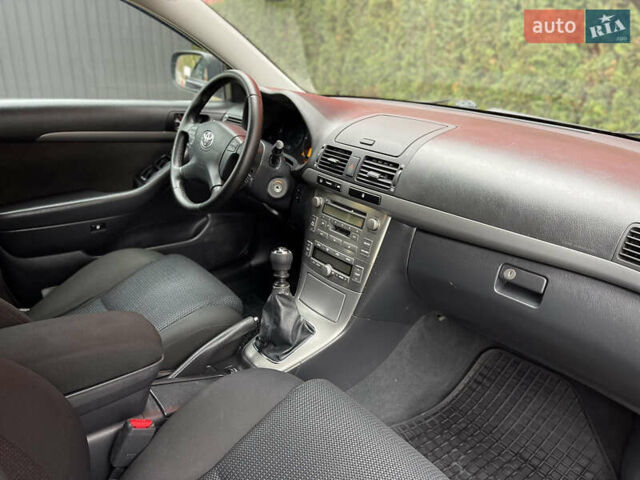 Черный Тойота Авенсис, объемом двигателя 2 л и пробегом 271 тыс. км за 6599 $, фото 22 на Automoto.ua