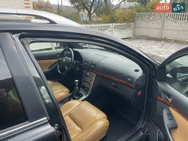 Черный Тойота Авенсис, объемом двигателя 2 л и пробегом 300 тыс. км за 6999 $, фото 28 на Automoto.ua