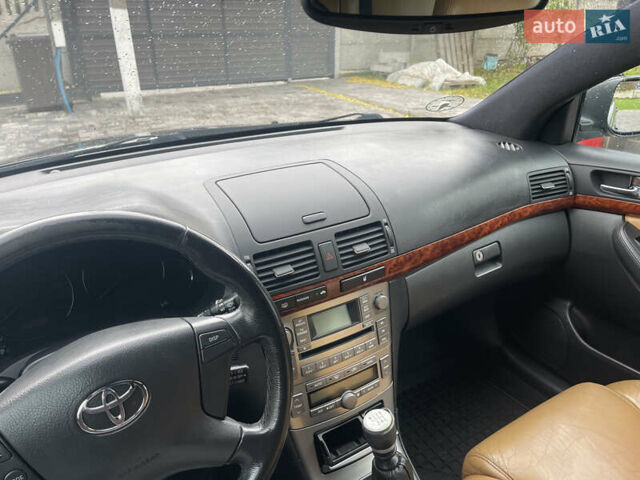 Черный Тойота Авенсис, объемом двигателя 2 л и пробегом 300 тыс. км за 6999 $, фото 18 на Automoto.ua