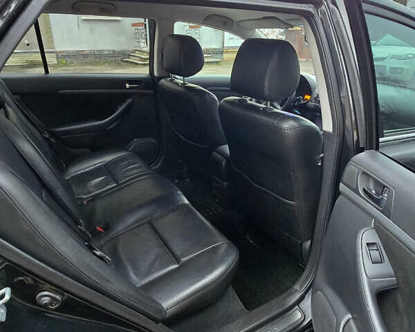 Черный Тойота Авенсис, объемом двигателя 2 л и пробегом 221 тыс. км за 7000 $, фото 9 на Automoto.ua