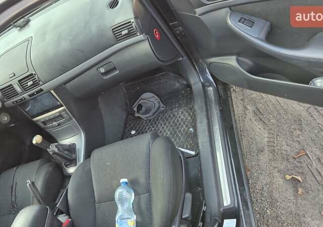 Чорний Тойота Авенсіс, об'ємом двигуна 1.8 л та пробігом 299 тис. км за 4600 $, фото 5 на Automoto.ua