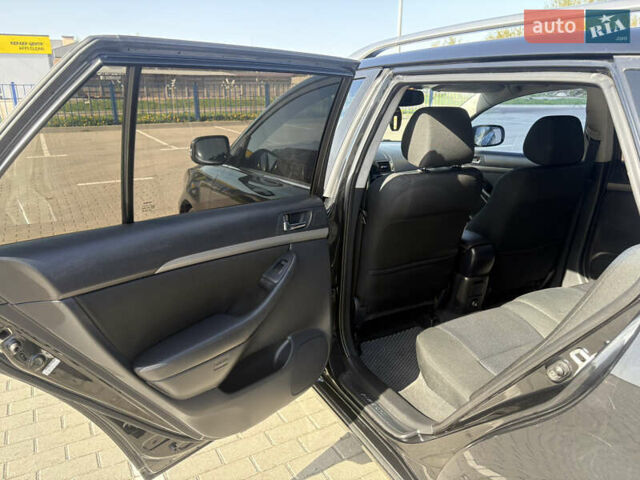 Чорний Тойота Авенсіс, об'ємом двигуна 2 л та пробігом 296 тис. км за 6200 $, фото 37 на Automoto.ua