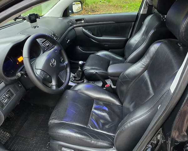 Черный Тойота Авенсис, объемом двигателя 2 л и пробегом 221 тыс. км за 7000 $, фото 8 на Automoto.ua