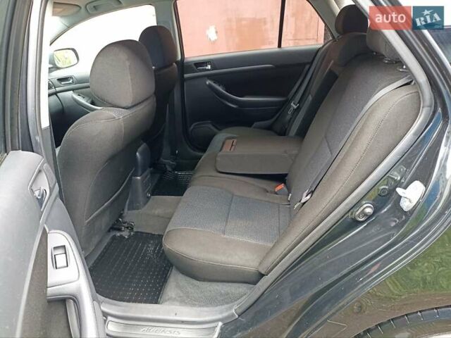 Чорний Тойота Авенсіс, об'ємом двигуна 2 л та пробігом 279 тис. км за 6500 $, фото 14 на Automoto.ua