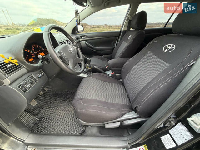 Черный Тойота Авенсис, объемом двигателя 1.8 л и пробегом 243 тыс. км за 7999 $, фото 25 на Automoto.ua