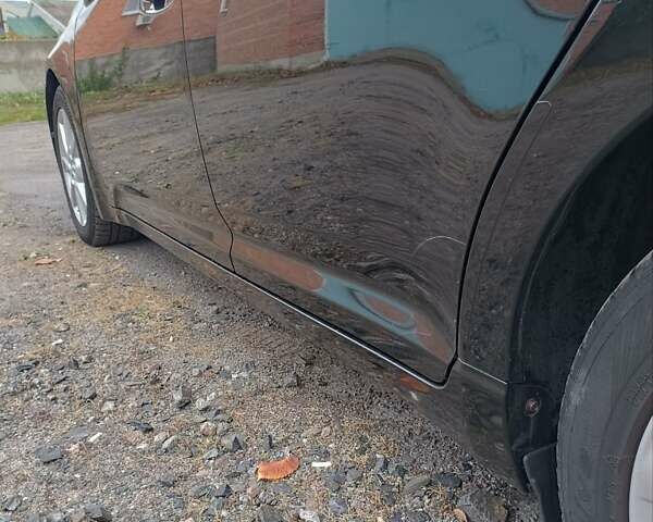 Черный Тойота Авенсис, объемом двигателя 1.6 л и пробегом 189 тыс. км за 8700 $, фото 7 на Automoto.ua