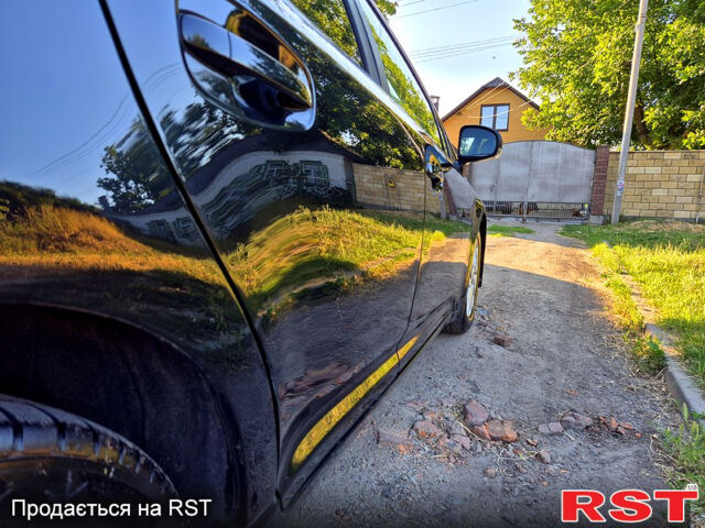 Черный Тойота Авенсис, объемом двигателя 2 л и пробегом 228 тыс. км за 6900 $, фото 5 на Automoto.ua