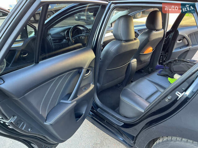 Черный Тойота Авенсис, объемом двигателя 2 л и пробегом 272 тыс. км за 11999 $, фото 8 на Automoto.ua