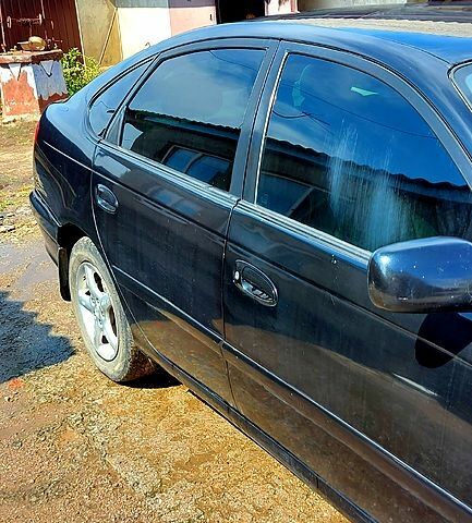 Черный Тойота Авенсис, объемом двигателя 1.8 л и пробегом 250 тыс. км за 2700 $, фото 1 на Automoto.ua