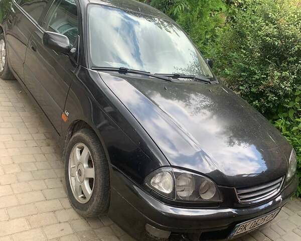 Черный Тойота Авенсис, объемом двигателя 1.76 л и пробегом 417 тыс. км за 2800 $, фото 3 на Automoto.ua